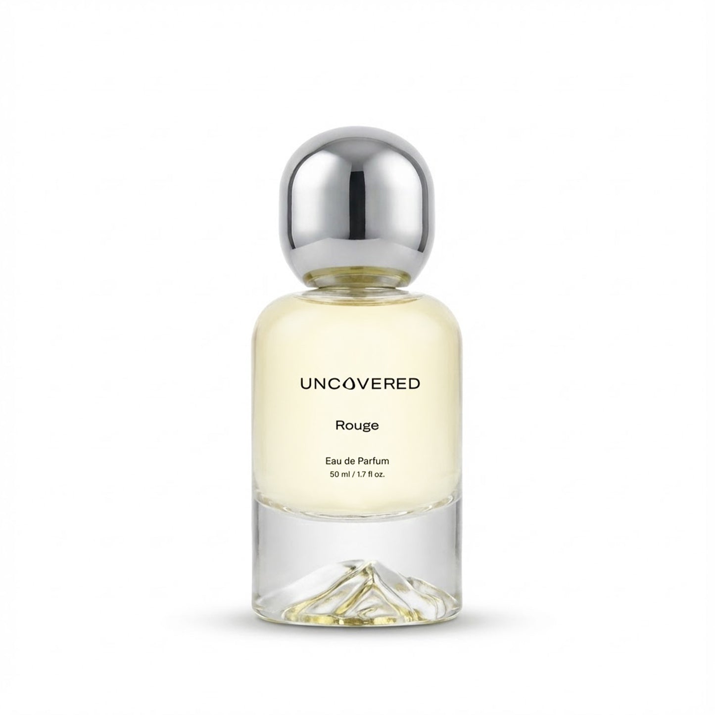 Perfume bottle labeled 'Uncovered Rouge' on a white background