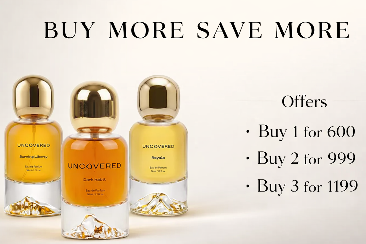 Three perfume bottles with gold caps on a light background, featuring promotional text.