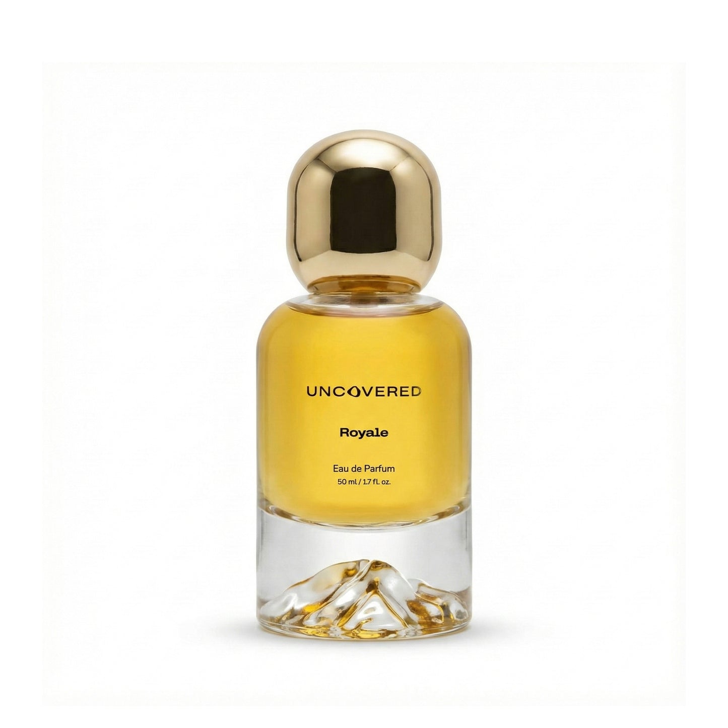 Perfume bottle labeled 'Uncovered Royale' with a gold cap on a white background